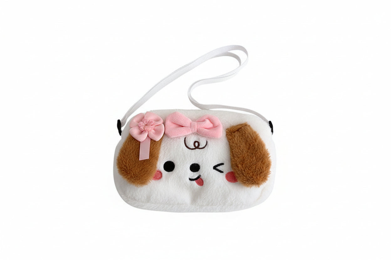 Plush toy dog with a pink bow on a white background