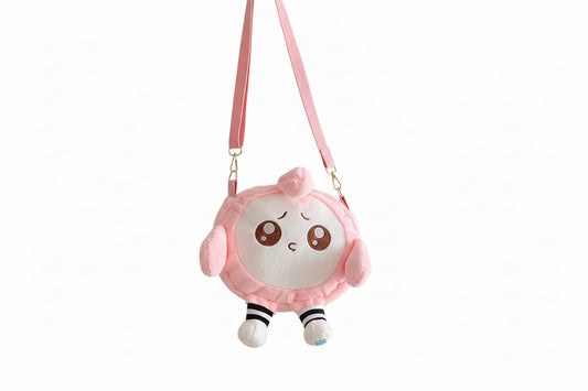 Pink plush backpack with a cute face design on a white background