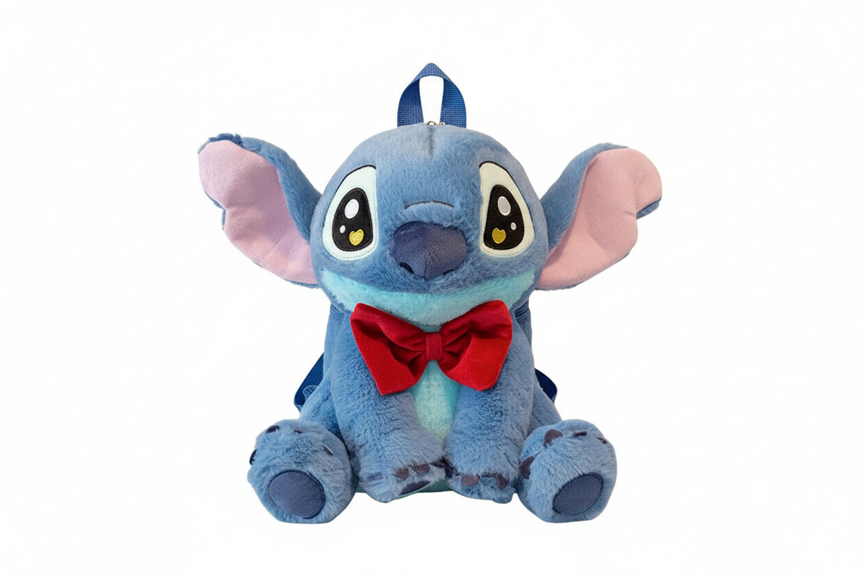 Plush toy backpack shaped like a cartoon character with a red bow tie on a white background