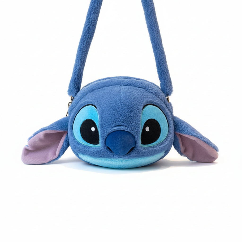 Blue plush bag shaped like a cartoon character on a white background