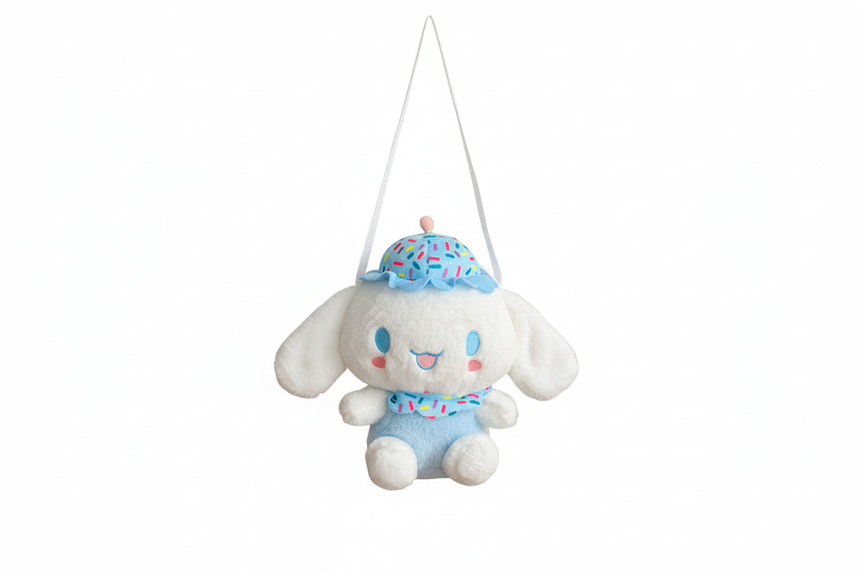 Plush toy with a blue outfit and colorful hat on a white background
