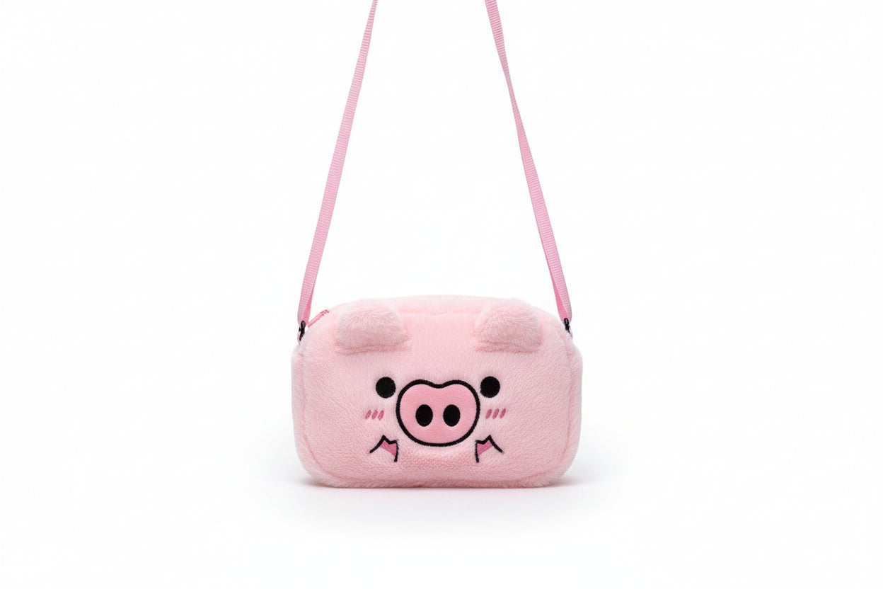 Pink plush bag with a pig face design on a white background