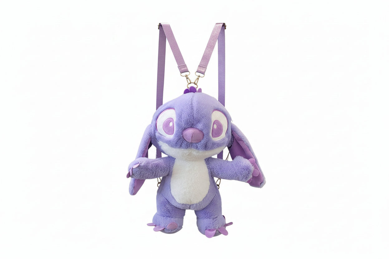 Purple plush toy with pink accents on a white background
