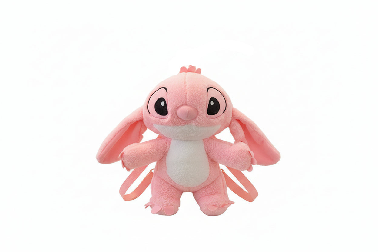 Pink plush toy with backpack on a white background