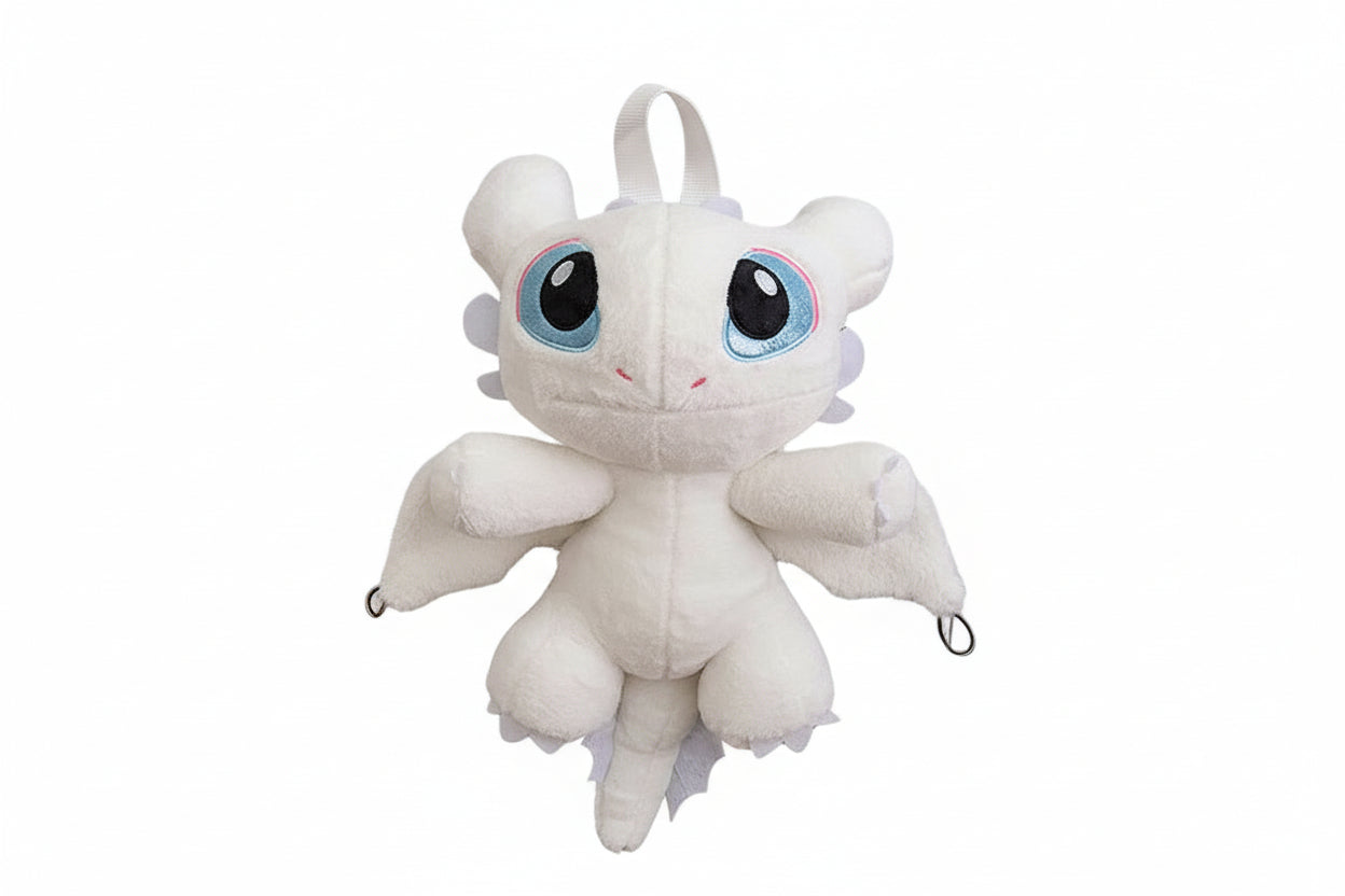 White dragon plush toy with black accents on a white background
