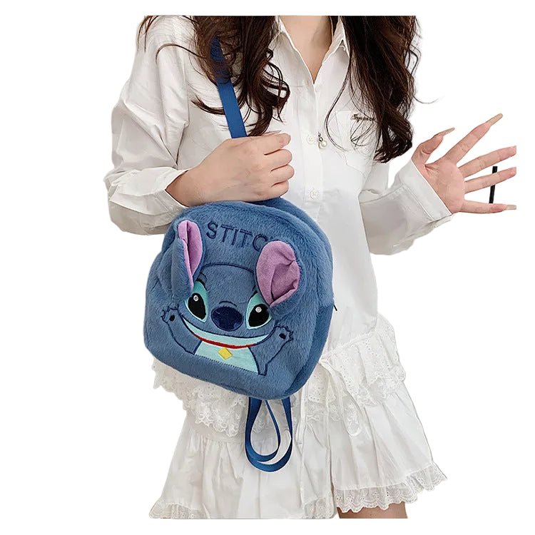 Blue backpack with 'Stitch' character on a white background