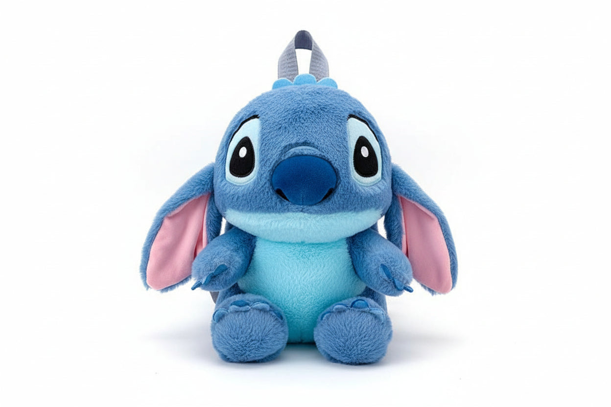 Blue plush toy with pink inner ears on a white background