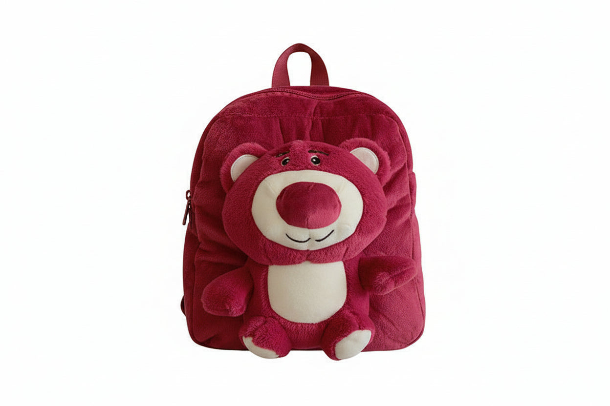 Pink teddy bear-shaped backpack on a white background